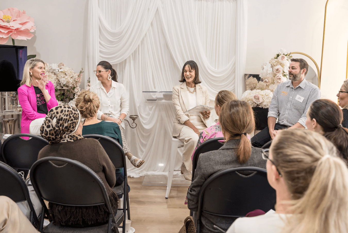 Kirsty Foster speaking on a panel at a local business event